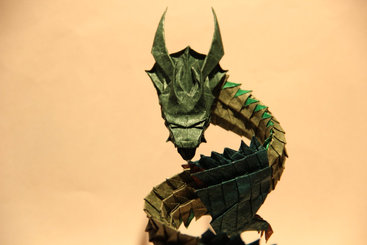 Origami coiled horned dragon