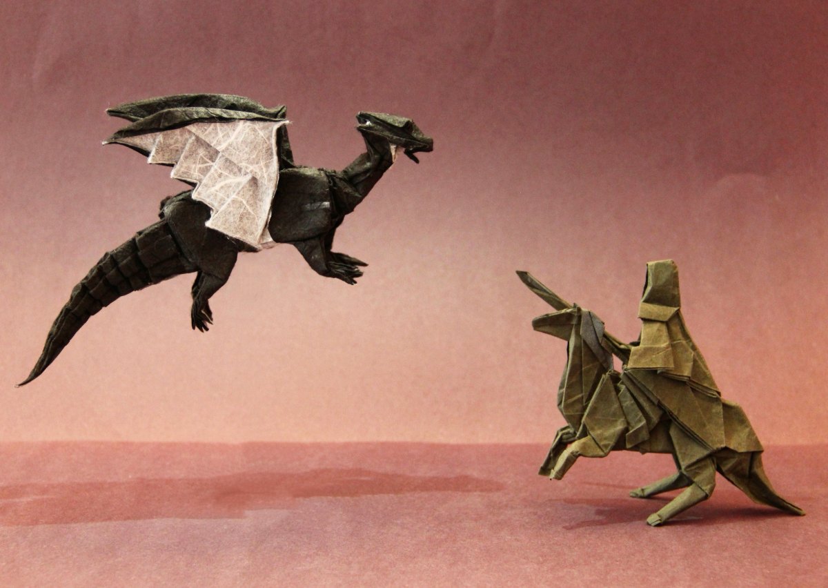 Origami dragon and knight scene