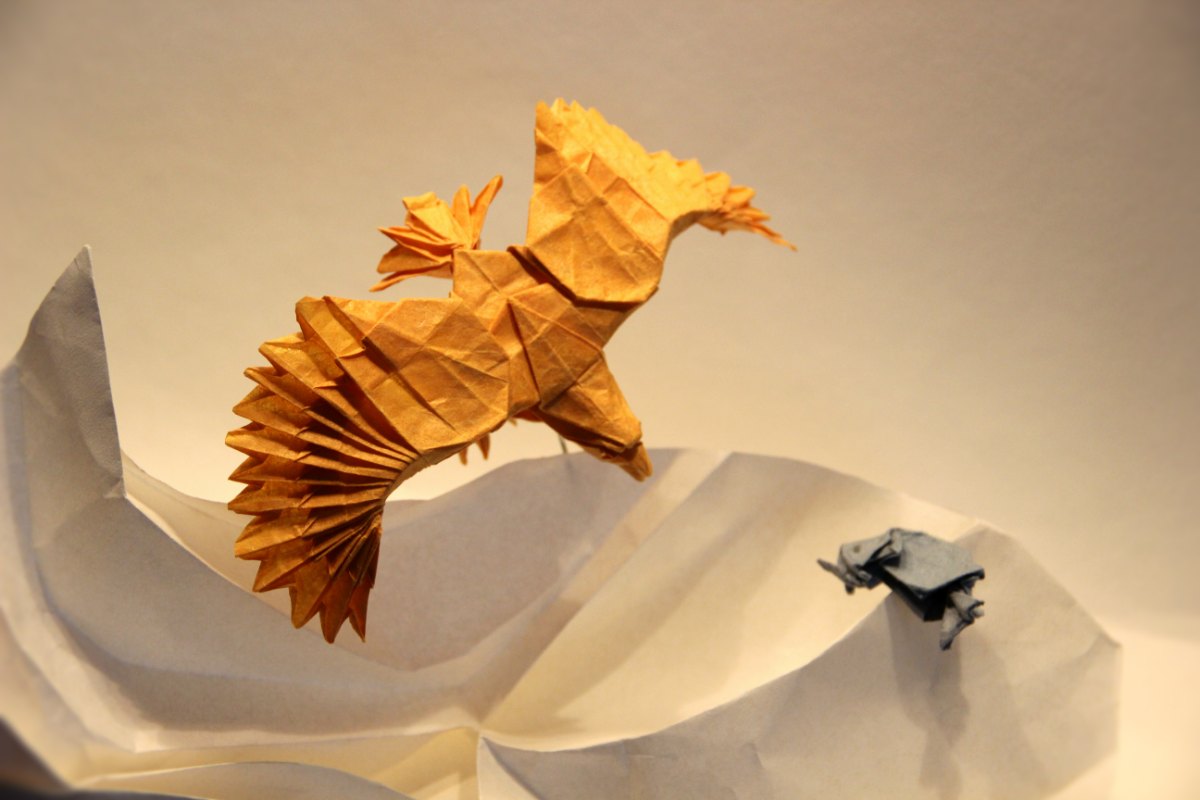Origami diving eagle